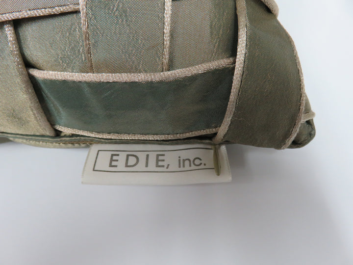 EDIE, inc. Throw Pillow