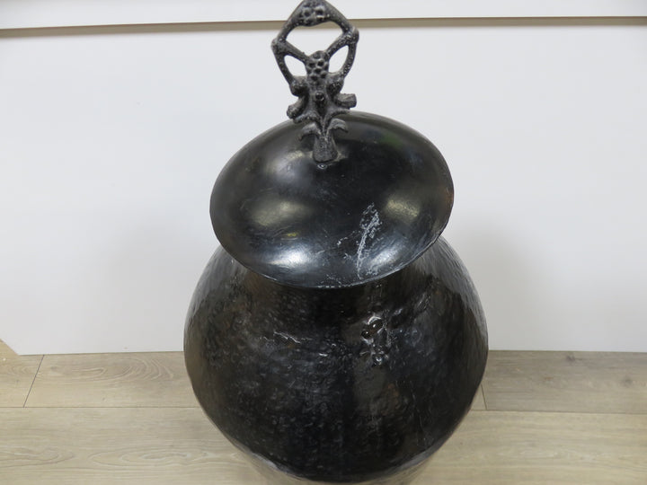 Tall Black Lidded Vessel