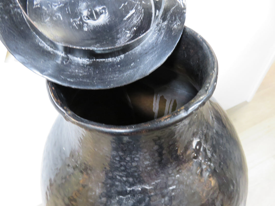 Tall Black Lidded Vessel