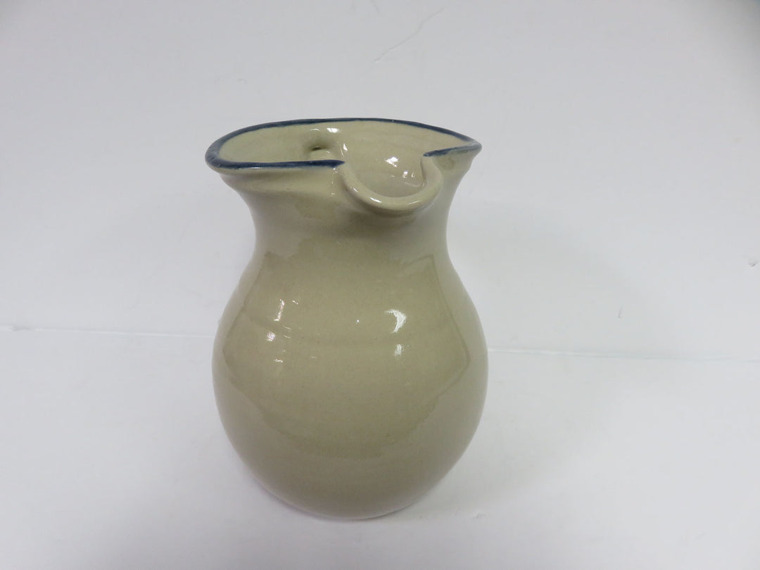 Red Wing Pitcher