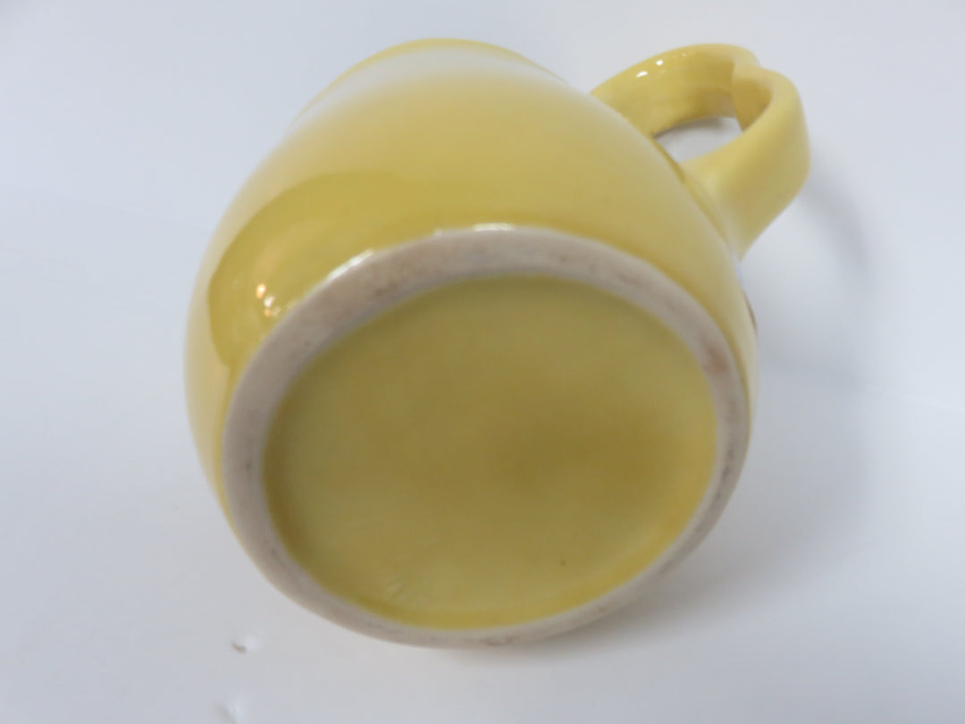 Yellow Ceramic Pitcher