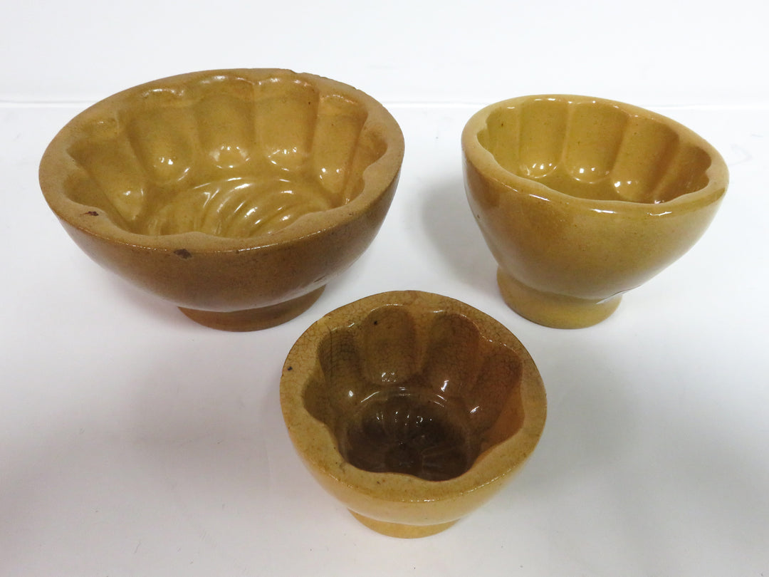Antique Yellow Ware Pudding Molds