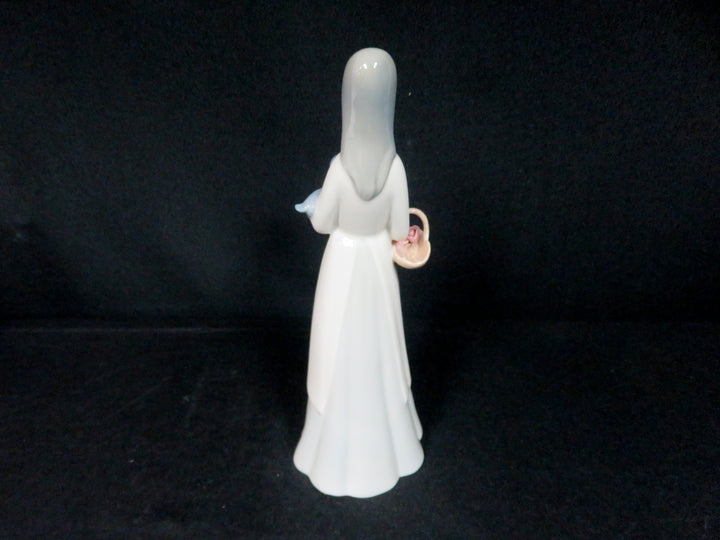 Girl with Dog Figurine