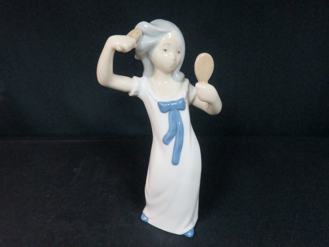 Girl with Mirror Figurine