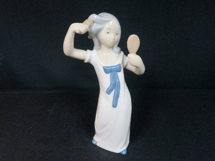 Girl with Mirror Figurine