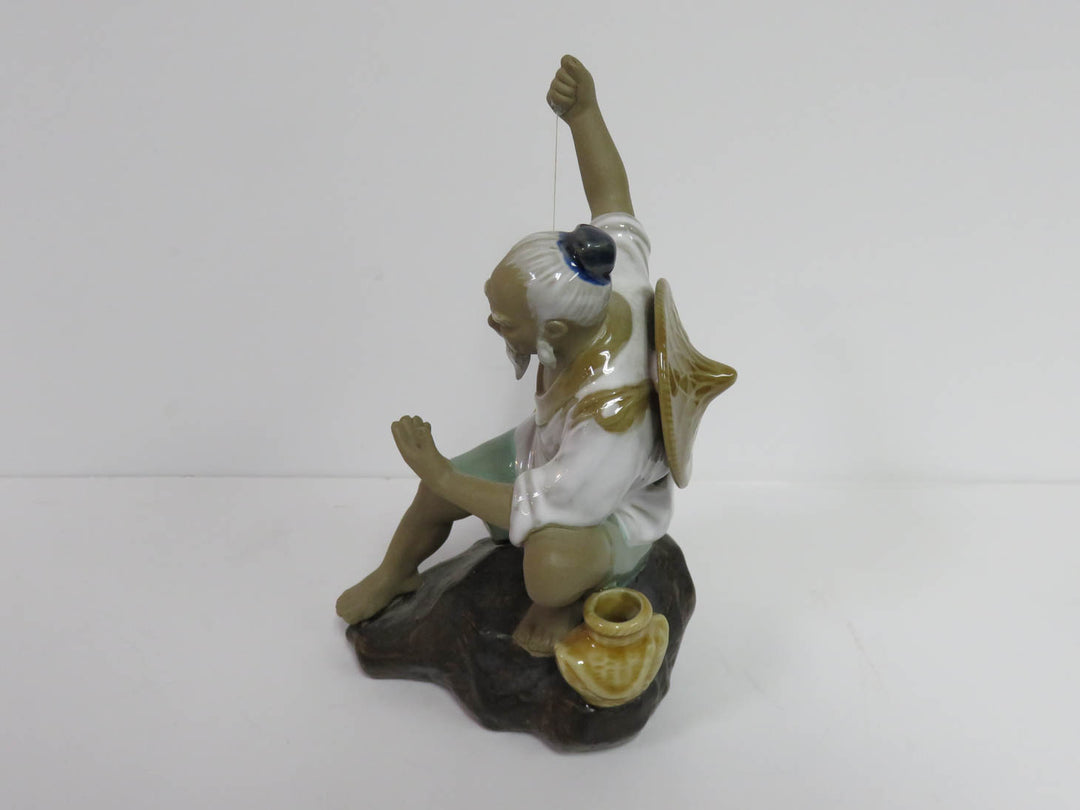 Mudman Fisherman Figurine