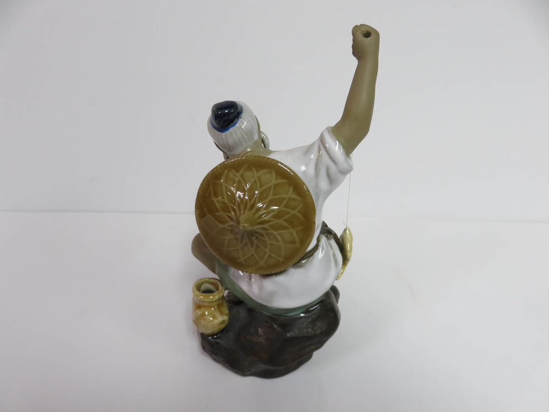 Mudman Fisherman Figurine