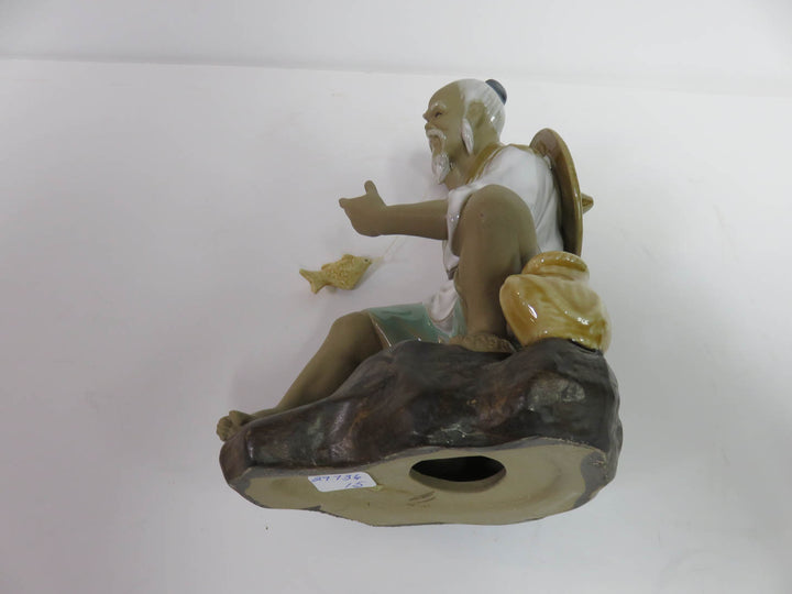 Mudman Fisherman Figurine