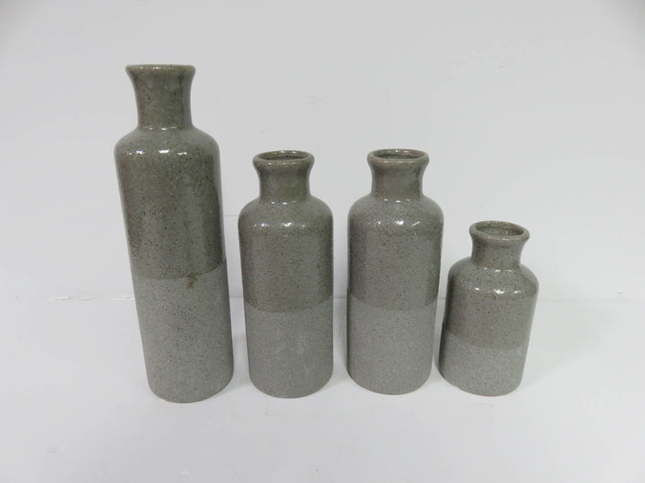 Four Grey Speckled Vases