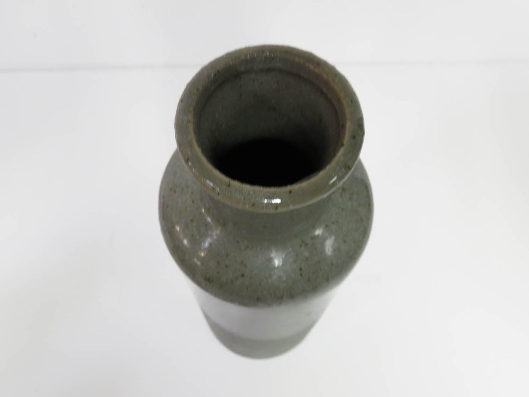 Four Grey Speckled Vases