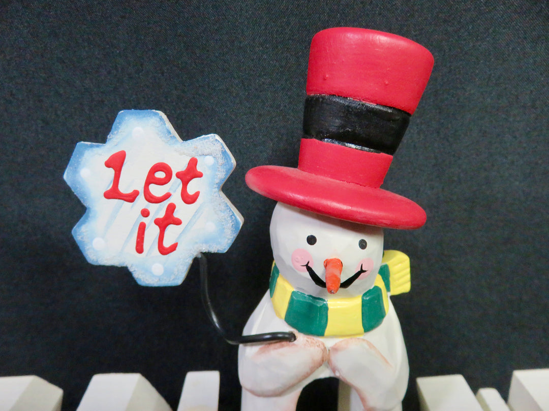 "SNOW" in Wood Letters