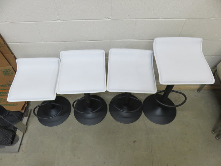 Four Adjustable Bar/Counter Stools