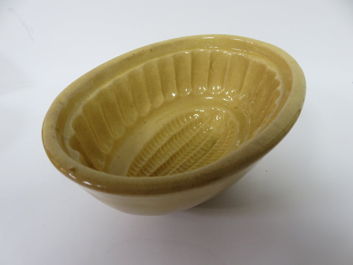 Antique Yellow Ware Pudding Molds