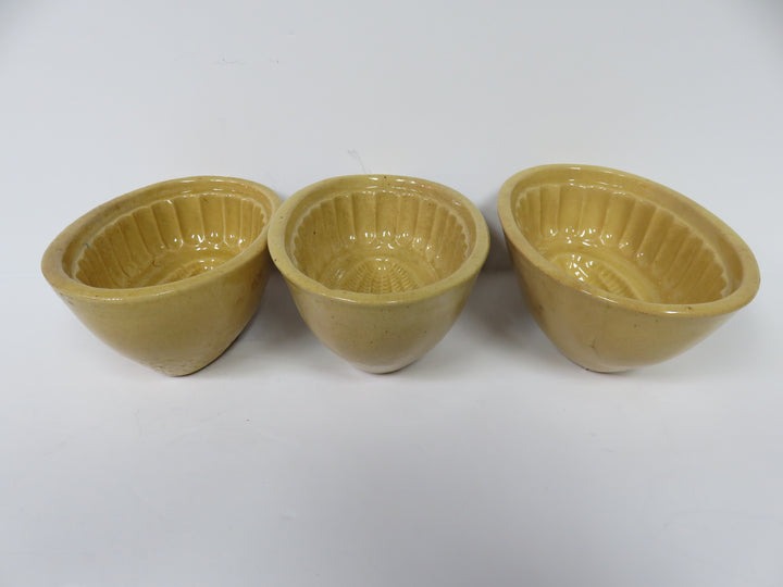 Antique Yellow Ware Pudding Molds