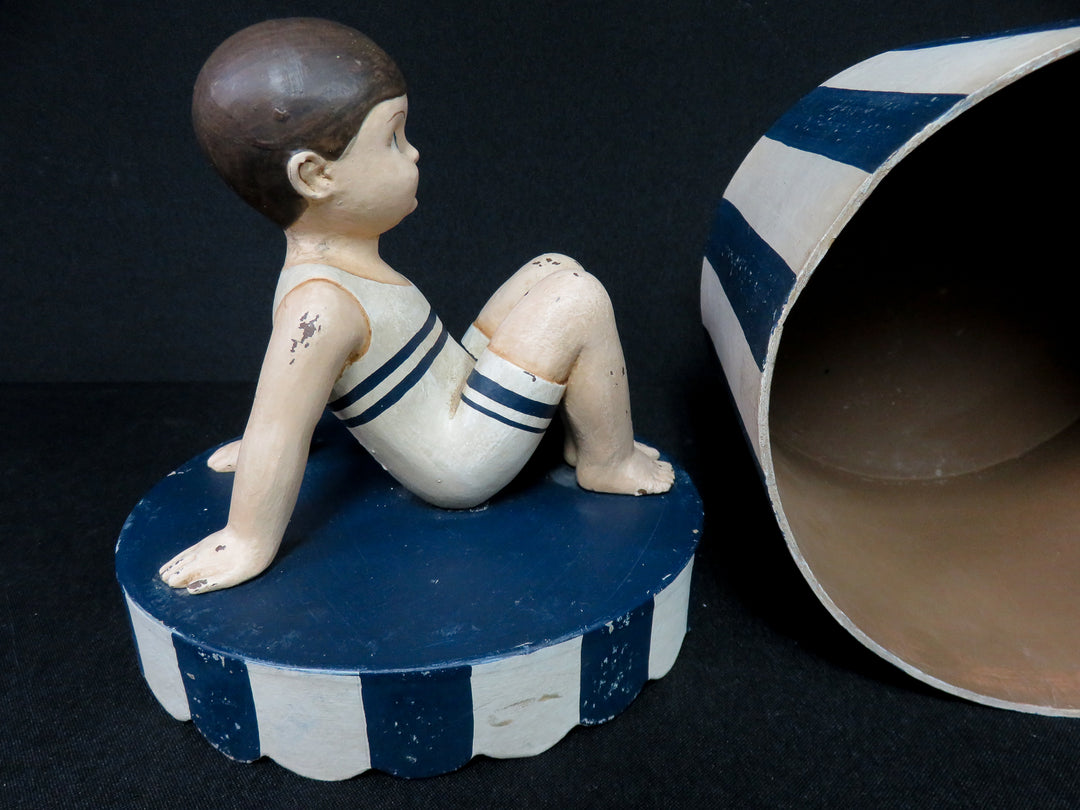 Boy on Striped Box