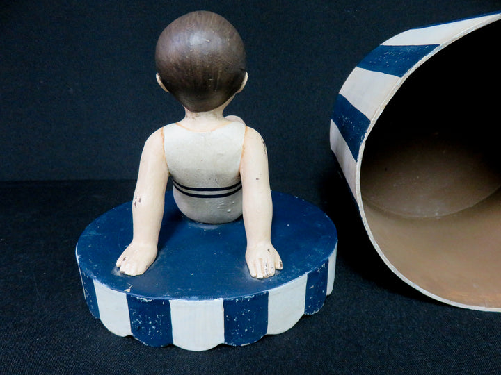 Boy on Striped Box