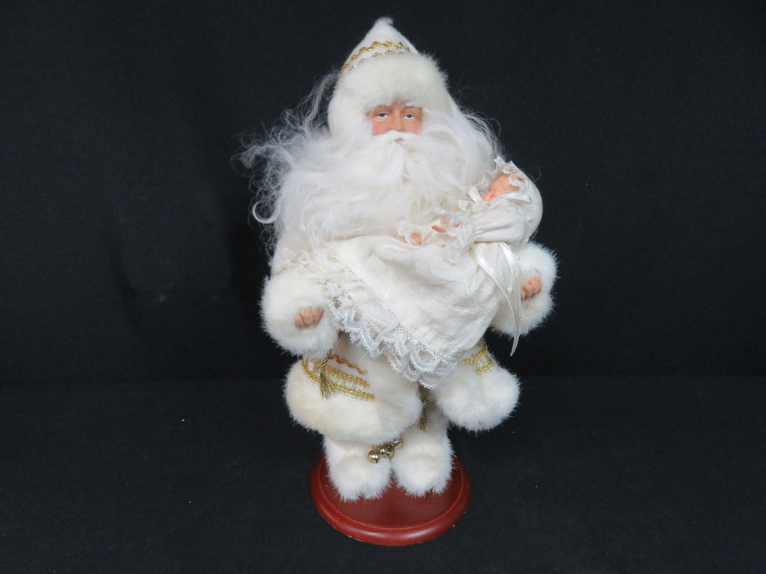 Santa Cradling Baby