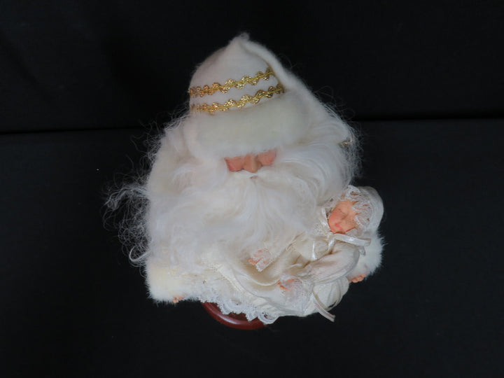 Santa Cradling Baby