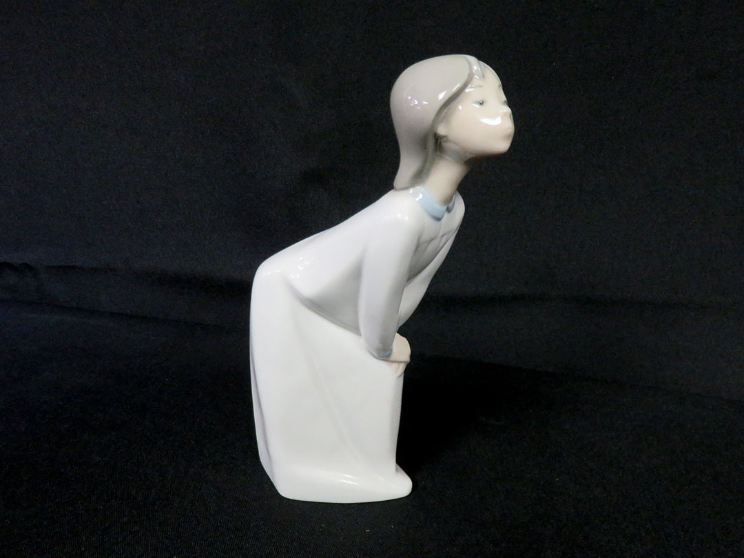 Lladró Kissing Girl Figurine