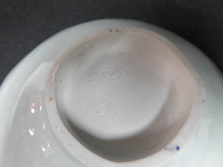 Pair Embossed Pottery Bowls