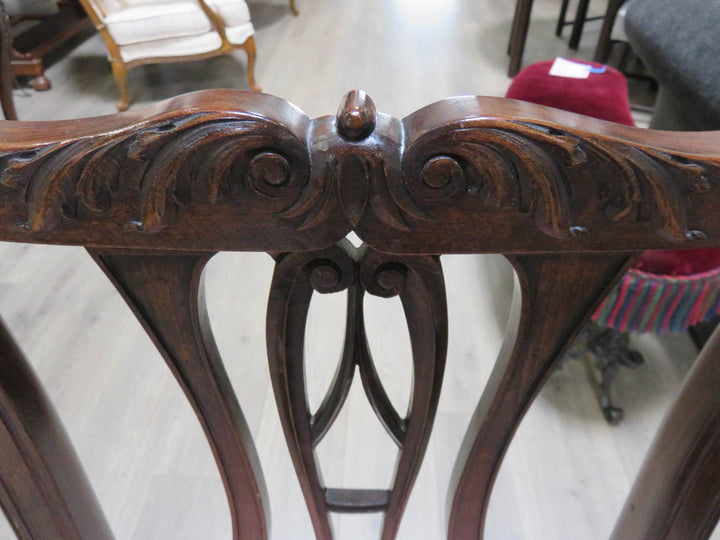 Four Chippendale Style Dining Chairs