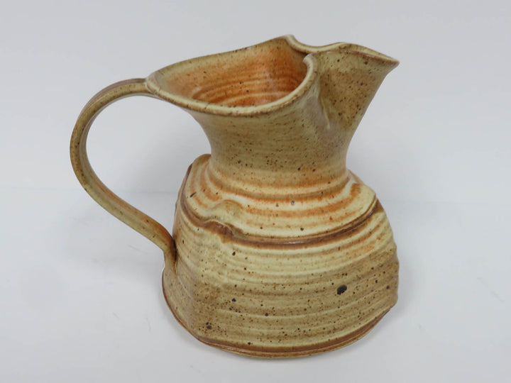 Sand Colored Pottery Pitcher