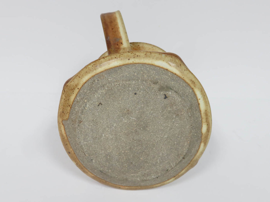 Sand Colored Pottery Pitcher