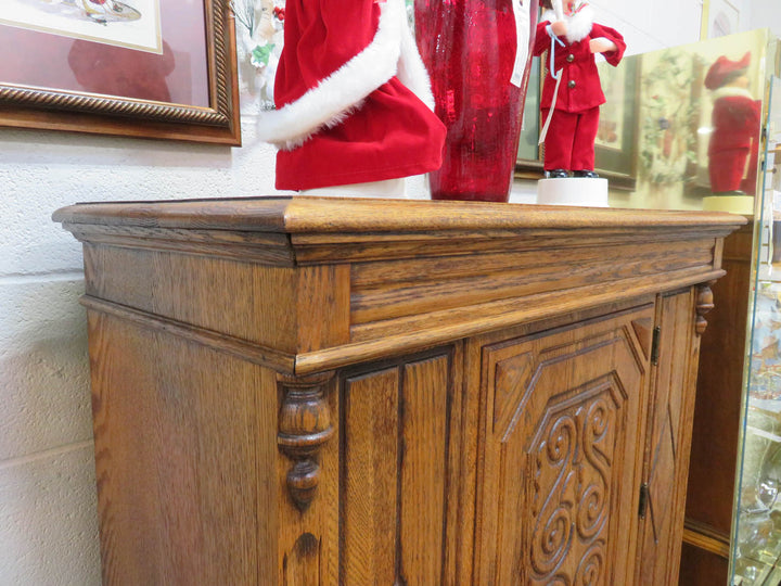 Carved Oak Vertical Cabinet