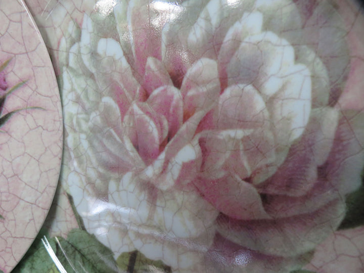 Four Floral Dinner Plates