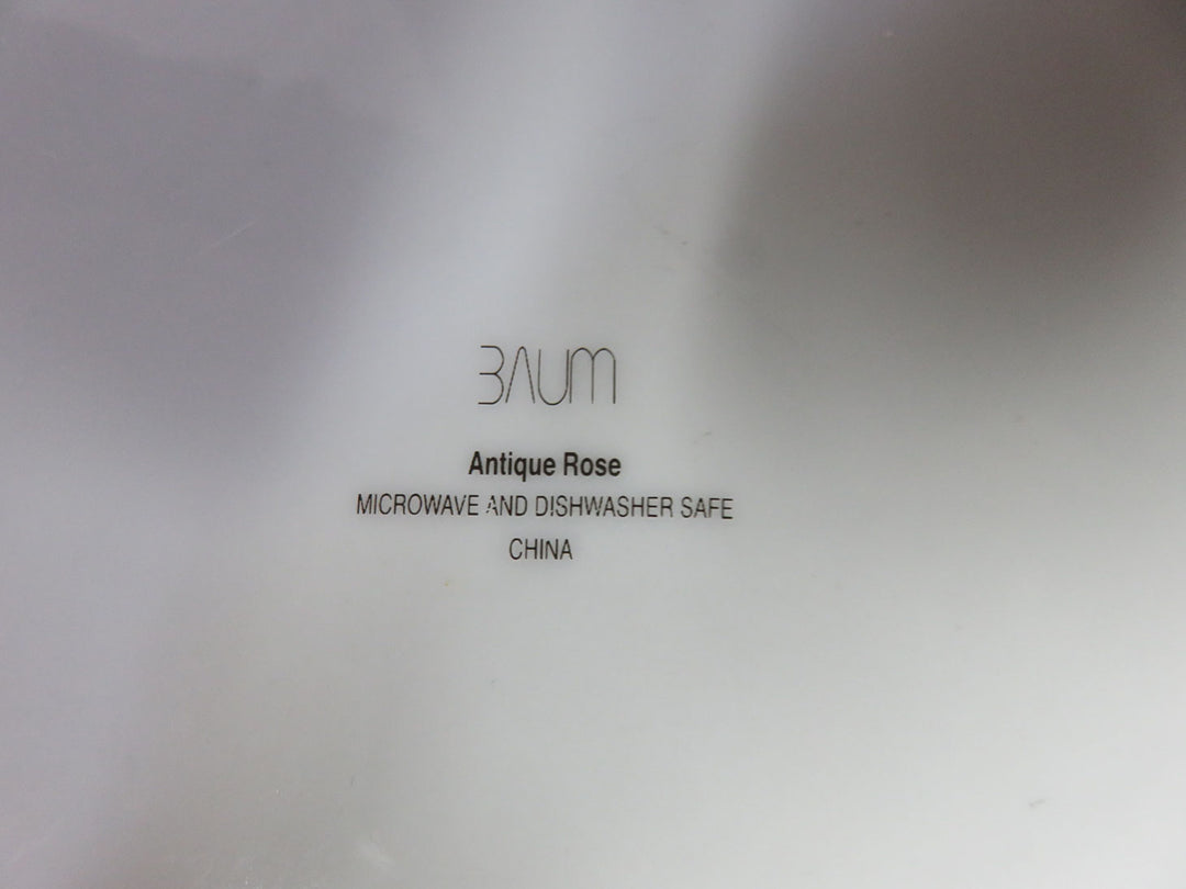 Four Floral Dinner Plates