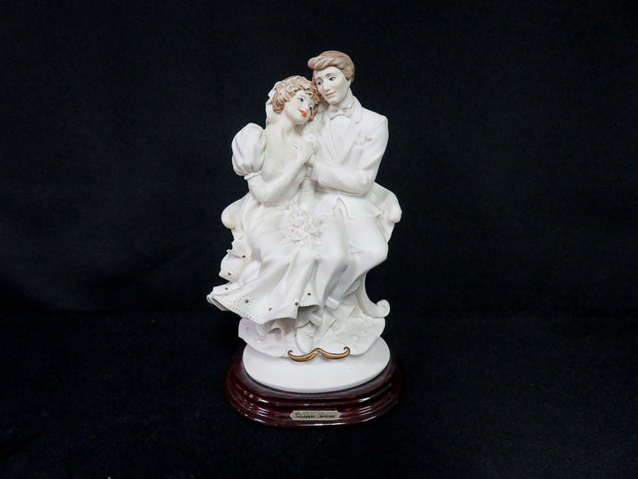 Armani Figurine on Stand