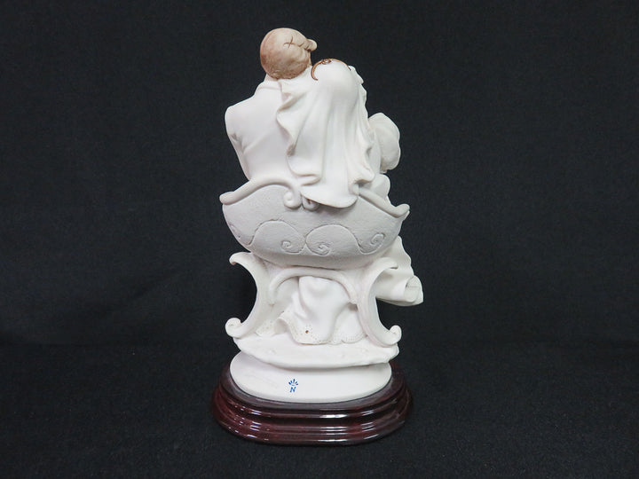 Armani Figurine on Stand