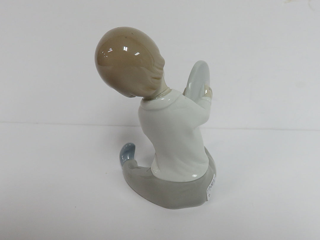 Lladró Boy Figurine