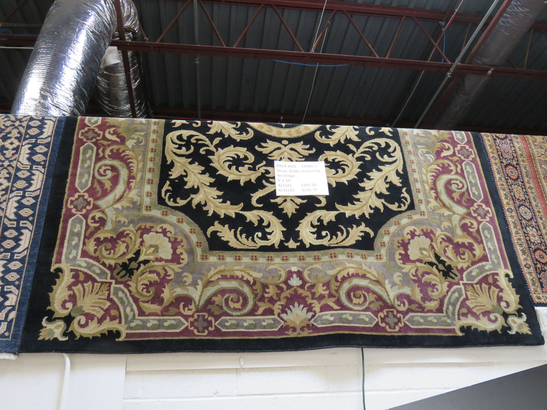 Black, Beige and Burgundy Area Rug