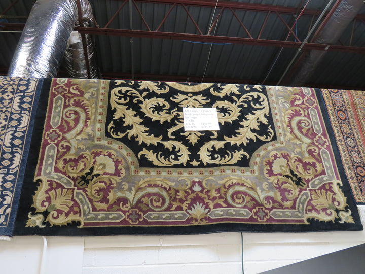 Black, Beige and Burgundy Area Rug