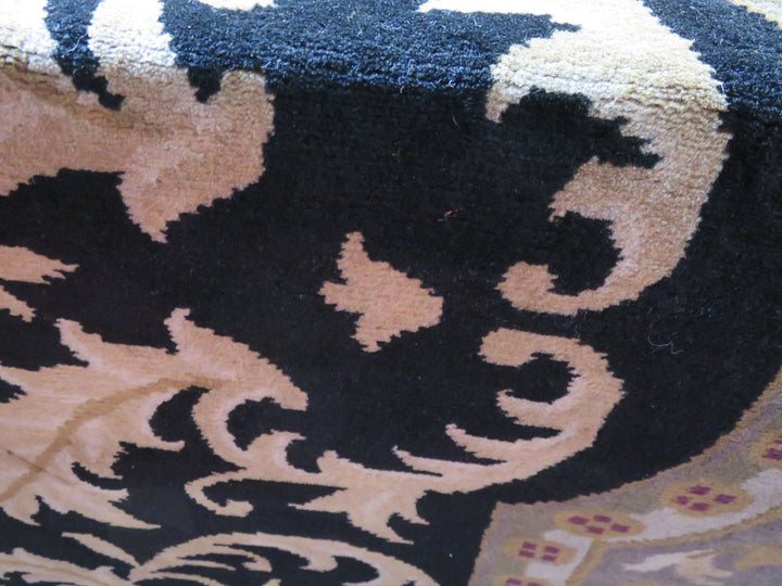Black, Beige and Burgundy Area Rug