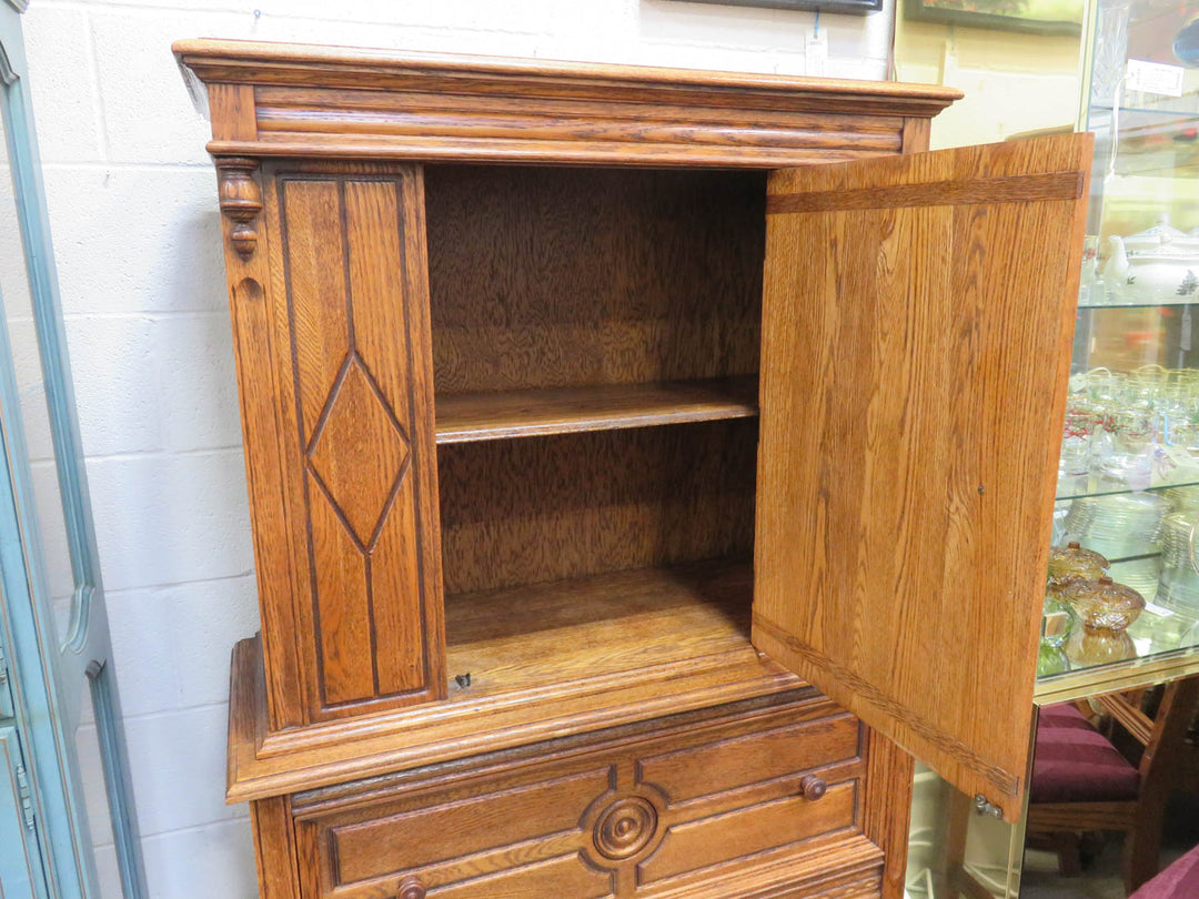 Carved Oak Vertical Cabinet