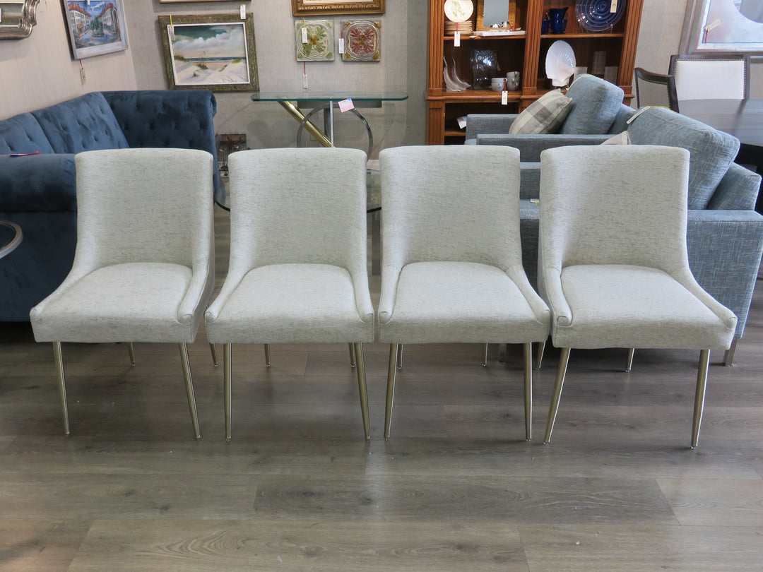 Four Beige Upholstered Dining Chairs
