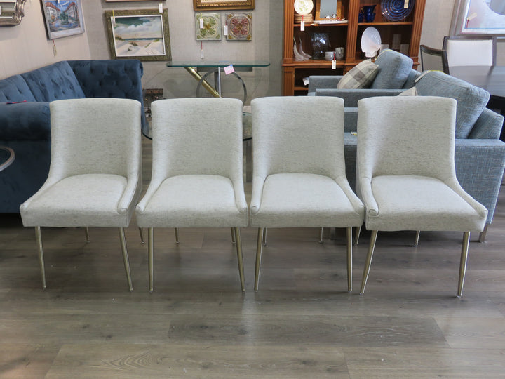 Four Beige Upholstered Dining Chairs