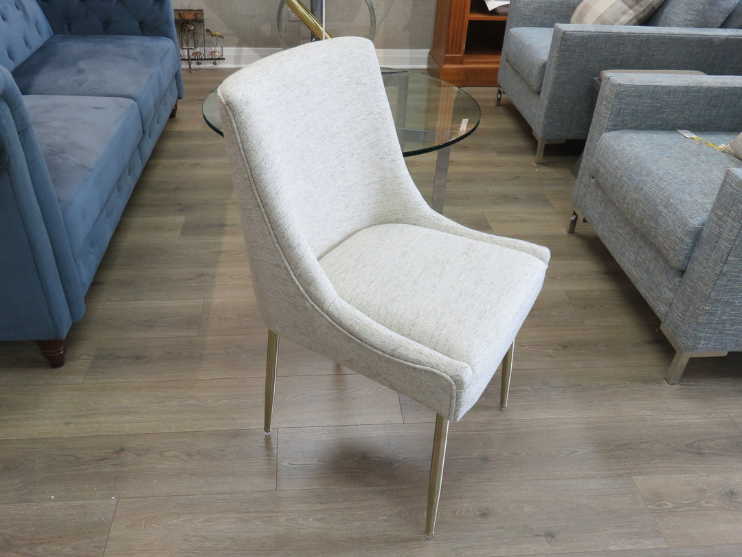 Four Beige Upholstered Dining Chairs