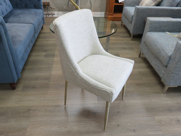 Four Beige Upholstered Dining Chairs