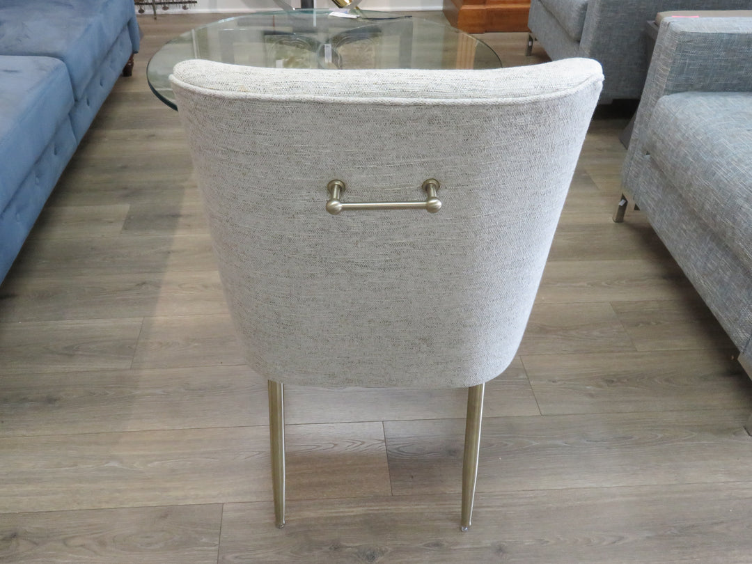 Four Beige Upholstered Dining Chairs