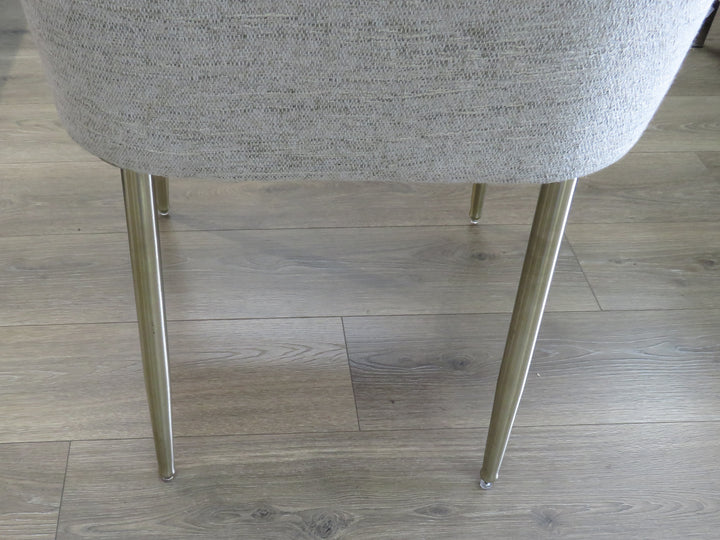 Four Beige Upholstered Dining Chairs