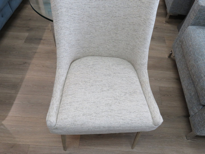 Four Beige Upholstered Dining Chairs