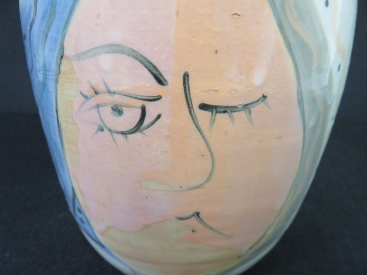 Winking Women Vessel