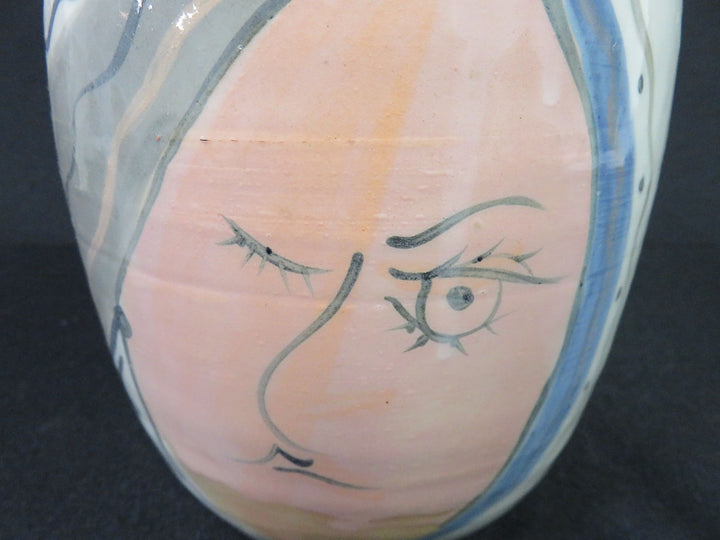 Winking Women Vessel