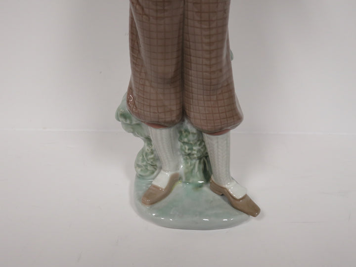 Lladró Golfer Figurine