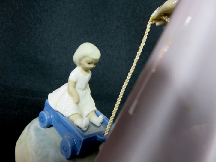 Lladró "Girl Pulling Toy Wagon"