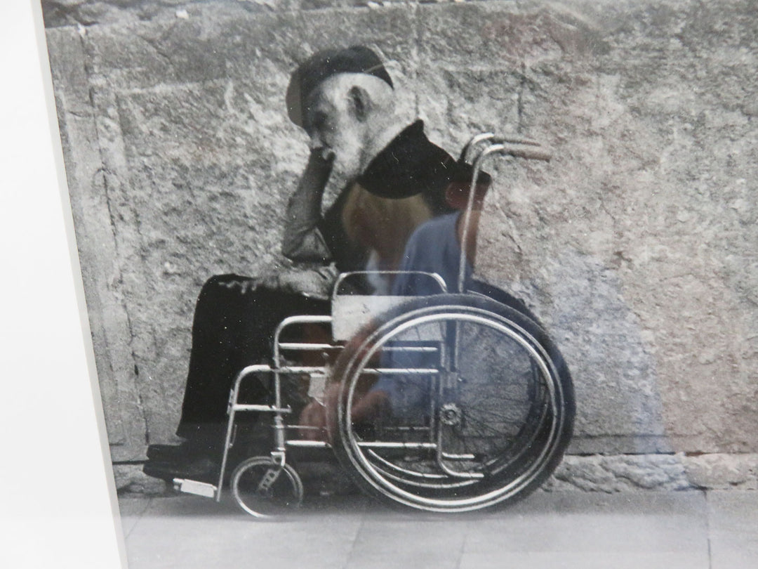 Man in Wheelchair and Child Stroller Photograph
