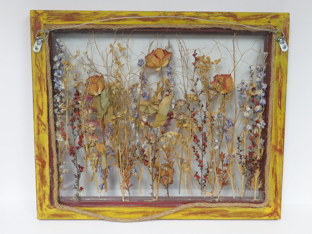 Dried Flowers in Window Frame